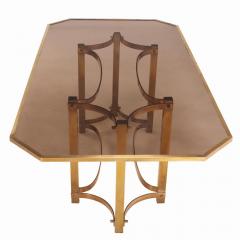 An Italian brass and smoked glass dining table C 1970  - 4137472