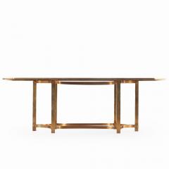 An Italian brass and smoked glass dining table C 1970  - 4137473