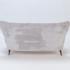 An Italian vintage wingback drop arm upholstered settee  - 2630651
