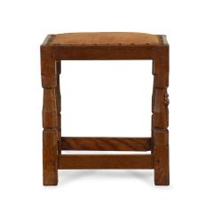 An adze cut Mouseman oak four legged stool - 3779620