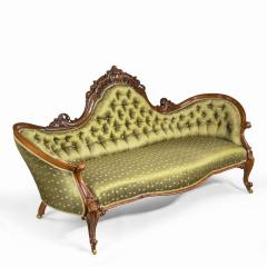 An elaborate Victorian shaped walnut sofa - 1846404