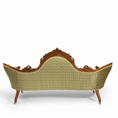 An elaborate Victorian shaped walnut sofa - 1846406