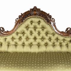 An elaborate Victorian shaped walnut sofa - 1846407