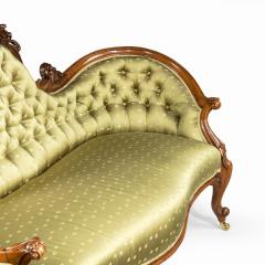 An elaborate Victorian shaped walnut sofa - 1846411