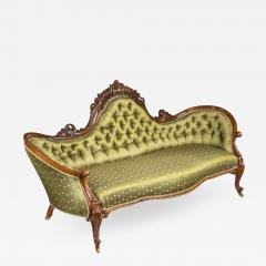 An elaborate Victorian shaped walnut sofa - 1847175