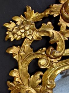 An exuberant Italian rococo revival carved gilt wood mirror - 718573