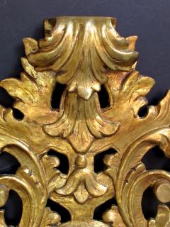 An exuberant Italian rococo revival carved gilt wood mirror - 718581