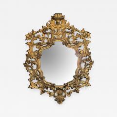 An exuberant Italian rococo revival carved gilt wood mirror - 721211