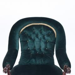 An imposing velvet upholstered library armchair with continuous arm 19th C  - 2381267
