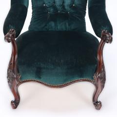 An imposing velvet upholstered library armchair with continuous arm 19th C  - 2381269
