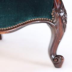 An imposing velvet upholstered library armchair with continuous arm 19th C  - 2381270