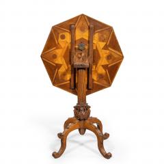 An octagonal indigenous specimen wood marquetry table - 2157644