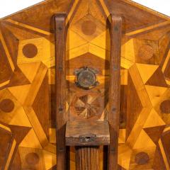 An octagonal indigenous specimen wood marquetry table - 2157646