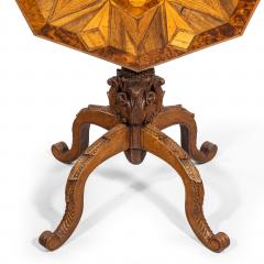 An octagonal indigenous specimen wood marquetry table - 2157649