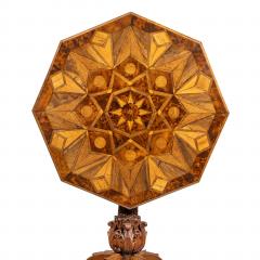 An octagonal indigenous specimen wood marquetry table - 2157650