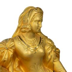 An ormolu mantel clock with Queen Victoria in medieval dress by Monroux 1832 - 3741400