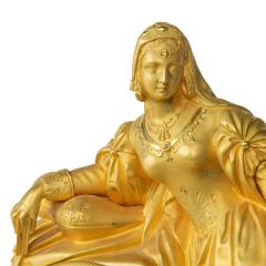 An ormolu mantel clock with Queen Victoria in medieval dress by Monroux 1832 - 3741404