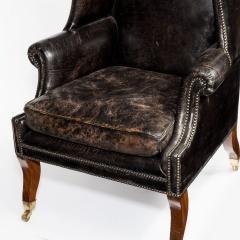 An unusual Regency mahogany sabre leg arm chair - 790548