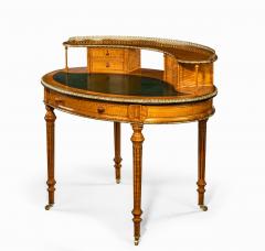 An unusual Victorian freestanding oval satinwood desk - 1629634