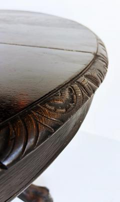 Antique Heavily Carved Griffins Wood Center Game Table on Casters - 4416337