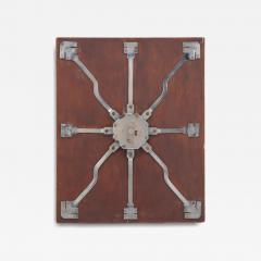 Antique steel lock mechanism mounted on a wooden board  - 4296833