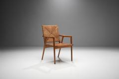 Armchair in Solid Oak and Cane Denmark ca 1960s - 1317663