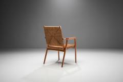 Armchair in Solid Oak and Cane Denmark ca 1960s - 1317665