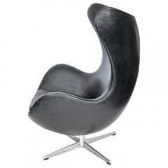 Arne Jacobsen Early Original Black Leather Egg Chair and Ottoman by Arne Jacobsen - 188886