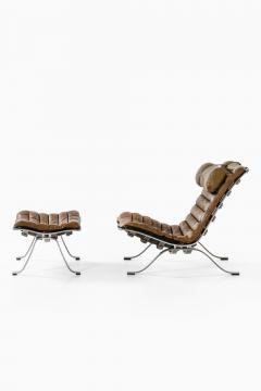 Arne Norell Easy Chair in Leather and Steel with Stool by Arne Norell 1970s - 4523528
