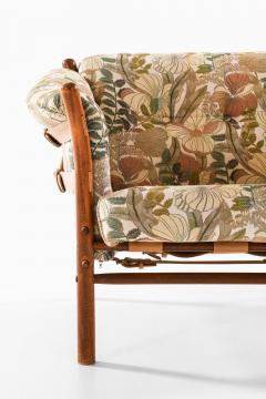 Arne Norell Pair of Indra Easy Chairs in Beech Brass Leather by Arne Norell 1970s - 4687905