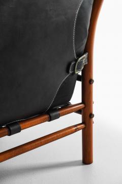 Arne Norell Pair of Mid Century Easy Chairs in Beech Brass Leather by Arne Norell 1960s - 4758967