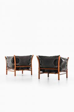 Arne Norell Pair of Mid Century Easy Chairs in Beech Brass Leather by Arne Norell 1960s - 4760421