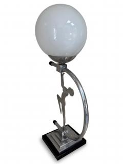 Art Deco Chome lamp with a lady supporting a white glass globe - 4672566