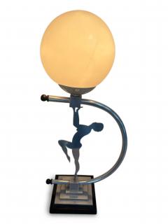 Art Deco Chome lamp with a lady supporting a white glass globe - 4672567