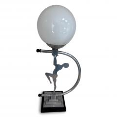 Art Deco Chome lamp with a lady supporting a white glass globe - 4735085