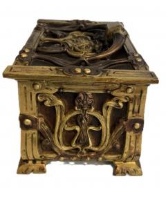 Art Nouveau brass and copper box with head and green velvet interior - 4658876