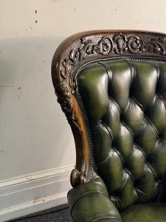 BEAUTIFUL ORNATELY CARVED WOOD AND BUTTON TUFTED LEATHER ARMCHAIR - 4297463