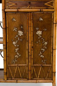 Bamboo 2 door cabinet with bone trim and side shelves and a back rail - 4639466