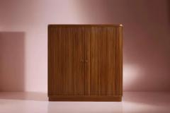 Beech wardrobe with roller shutters glass shelves interior light Italy 1950s - 4135178