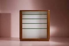 Beech wardrobe with roller shutters glass shelves interior light Italy 1950s - 4135181