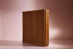Beech wardrobe with roller shutters glass shelves interior light Italy 1950s - 4135188