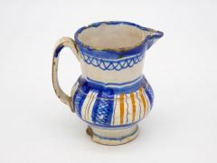 Blue and Yellow Striped Pitcher - 2184109