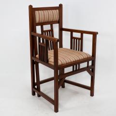 Bombay Art Furniture An Anglo Japanese Walnut armchair with a double back leg  - 4192909