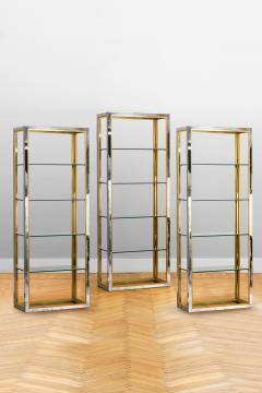Brass and chromed metal bookcases with glass shelves Italy 1980 - 3382003