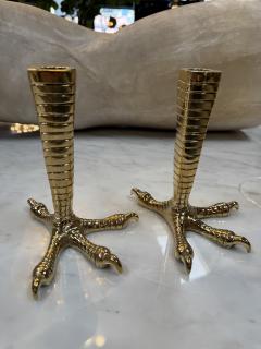 Brass candle holders designed in the shape of bird talons - 4299345