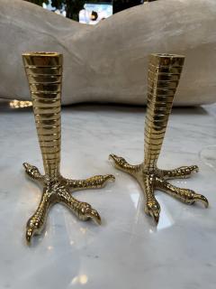 Brass candle holders designed in the shape of bird talons - 4299347