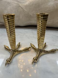 Brass candle holders designed in the shape of bird talons - 4299349