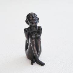 Bronze Sculpture of a Sitting Man - 4608834