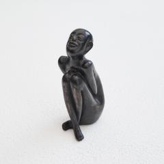 Bronze Sculpture of a Sitting Man - 4608837