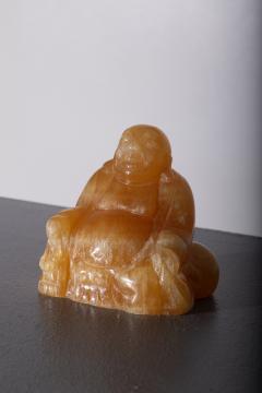 Budai Buddha in orange jade - 3865842